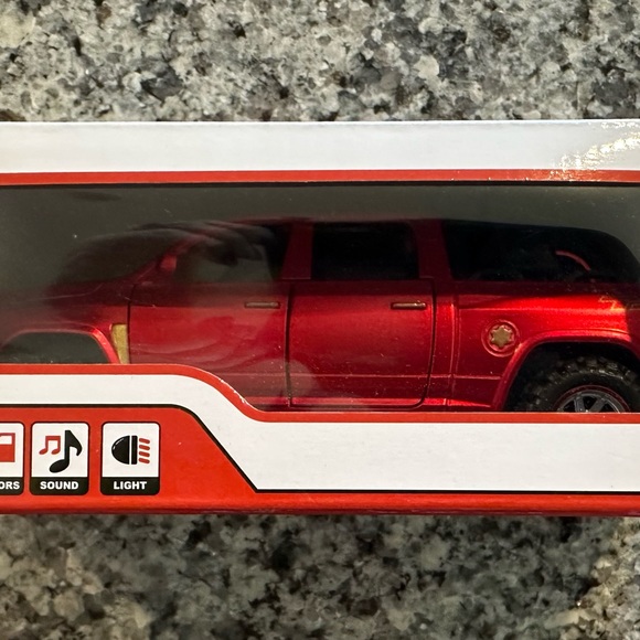 Pull Back Model Truck with lights, openable doors, sounds , and lights. - Picture 2 of 4